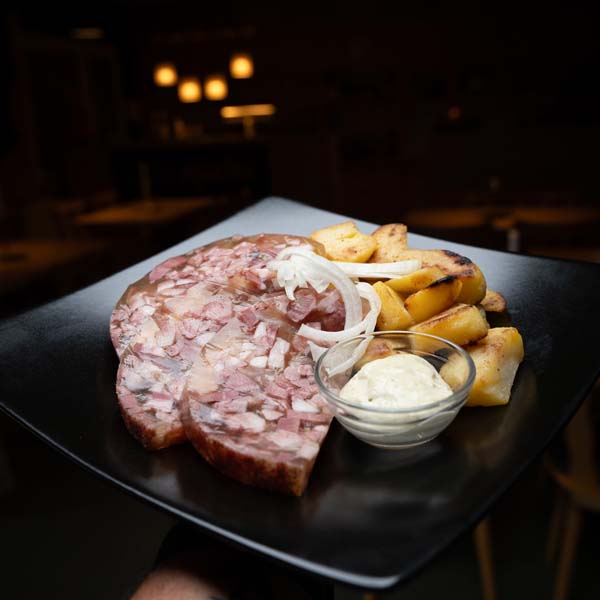 Teller mit Bauernsülze